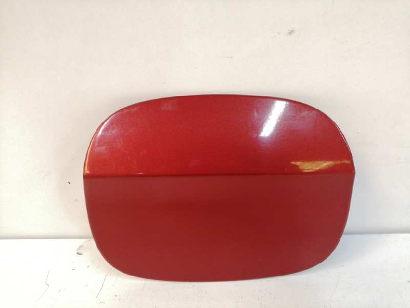 TAPA EXTERIOR COMBUSTIBLE