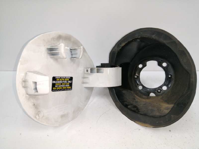 TAPA EXTERIOR COMBUSTIBLE