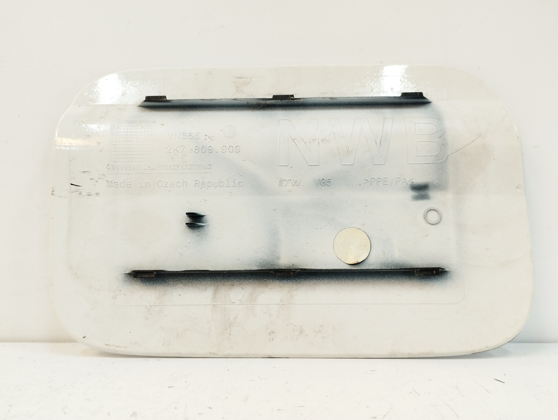 TAPA EXTERIOR COMBUSTIBLE