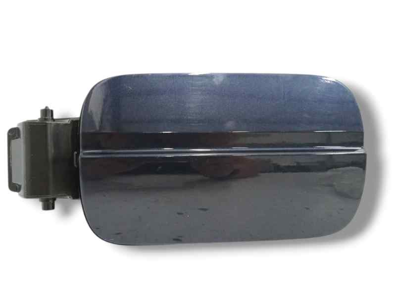 TAPA EXTERIOR COMBUSTIBLE
