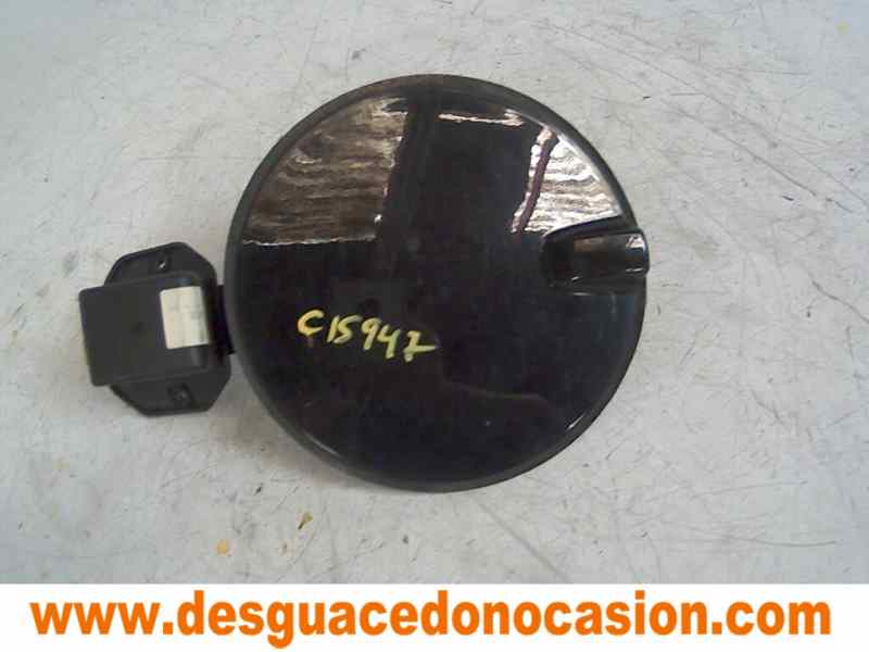 TAPA EXTERIOR COMBUSTIBLE