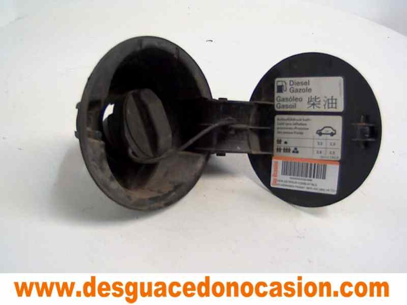 TAPA EXTERIOR COMBUSTIBLE