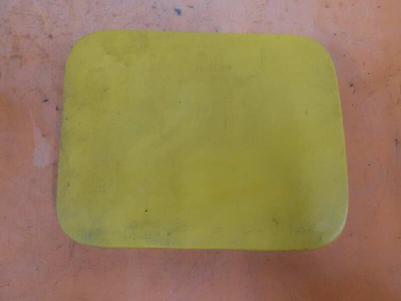 TAPA EXTERIOR COMBUSTIBLE